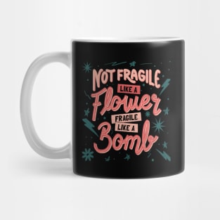 Not fragile like a flower, fragile like a bomb by Tobe Fonseca Mug